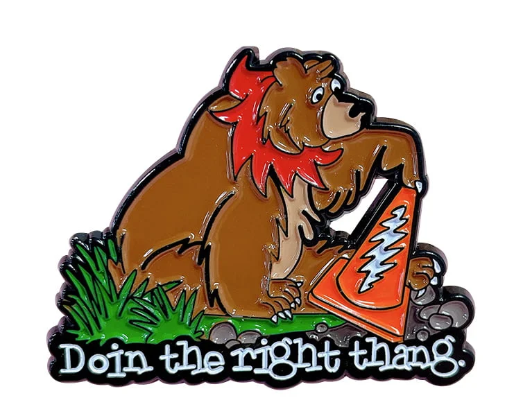 Custom soft enamel pin featuring a bear with a lightning traffic cone and text