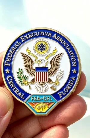 Custom challenge coin for the Federal Executive Association Central Florida (FEA-CFL) featuring an American eagle emblem, blue-and-white enamel details, and a palm tree design element.