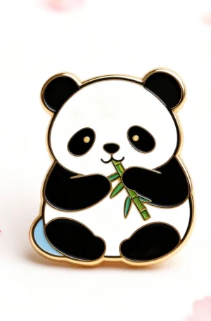 Custom enamel pin featuring a cute giant panda eating green bamboo with gold plating and glossy finish