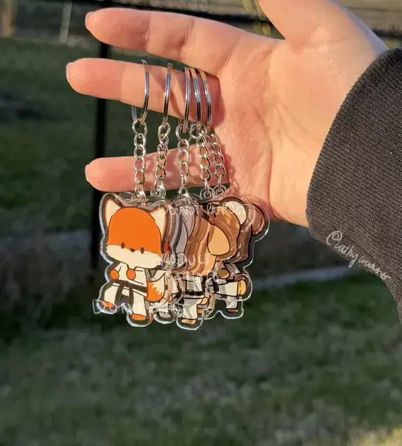 Client review photo of custom acrylic keychain