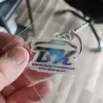 Client review photo of custom acrylic keychain