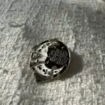 Client review photo of custom enamel pin