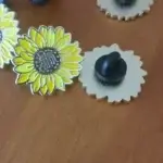 Client review photo of custom enamel pin
