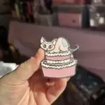 Client review photo of custom enamel pin