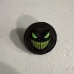 Client review photo of custom enamel pin