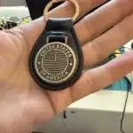 Client review photo of custom leather keychain